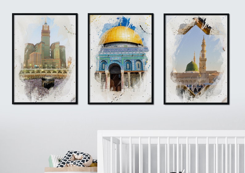 May include: Three framed watercolor paintings of famous mosques. The first painting shows the Kaaba in Mecca, Saudi Arabia. The second painting shows the Dome of the Rock in Jerusalem, Israel. The third painting shows the Prophet's Mosque in Medina, Saudi Arabia.