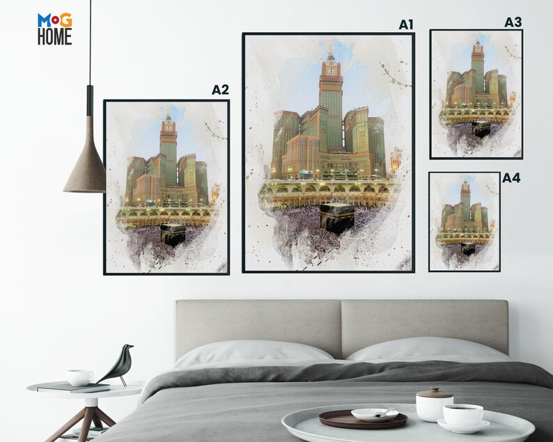 May include: A watercolor painting of the Kaaba in Mecca, Saudi Arabia. The painting is in a white frame with black trim. The painting is available in four sizes: A1, A2, A3, and A4.