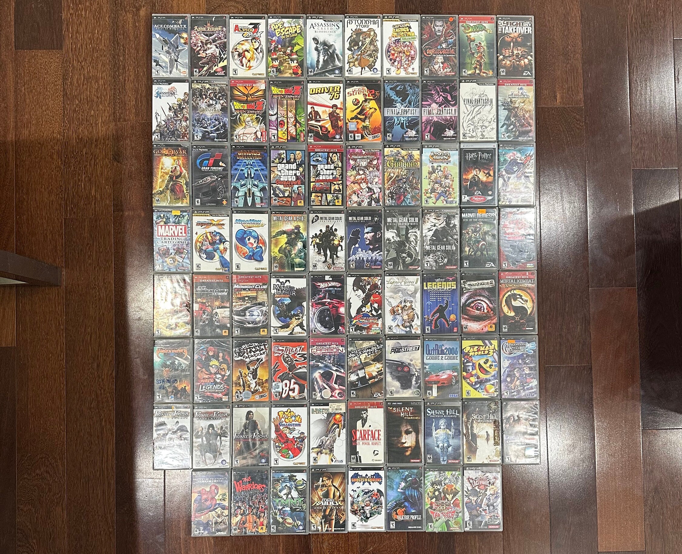 100 以上の本物の Sony PSP ゲーム コレクション *お気に入りを