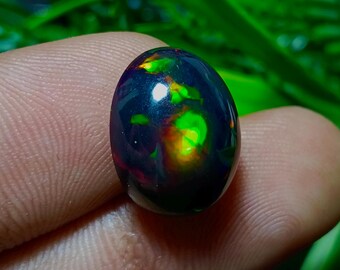 Schwarzer äthiopischer Opal Edelstein, handgemachter Welo Opal Cabochon (15X13X8 mm)