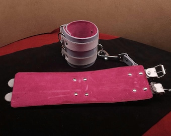 Blue Leather Wrist Restraints with White Straps and Pink Suede lining