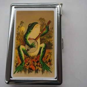 Premium Double Sided Cigarette Case With Frog Playing A Banjo Has Hidden Butane lighter