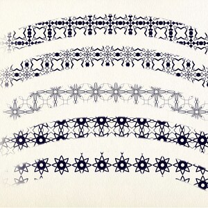May include: Five black and white decorative borders with intricate geometric patterns. The borders are arranged in a curved shape, with the top border being the largest and the bottom border being the smallest.
