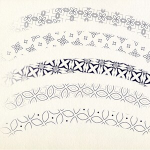 May include: Five black and white patterned borders with different geometric designs. The borders are arranged in a vertical stack, with the top border being the largest and the bottom border being the smallest.