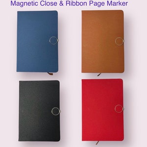May include: Four notebooks with magnetic closures and ribbon page markers. The notebooks are in blue, brown, black, and red.