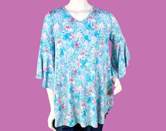 Top vintage ligero de poliéster azul con estampado floral, mangas acampanadas, talla mediana