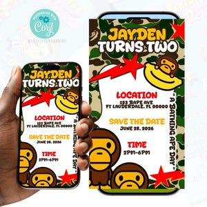 May include: A digital invitation design for a second birthday party. The invitation features a camouflage background with the text "JAYDEN TURNS TWO" in green and yellow. Includes event details: location, date, and time.