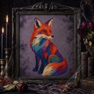 May include: A cross-stitch embroidery of a fox featuring a vibrant, multi-colored palette of orange, blue, purple, and yellow threads. The fox is depicted in a seated position against a dark, mottled purple fabric background, framed in a black frame.