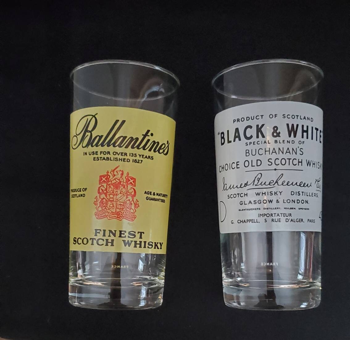 A Vintage Set of Ballantines Scotch Whiskey Longdrink Glasses Tumblers  golden Rim and Black Colored Coat of Arms and Titles 