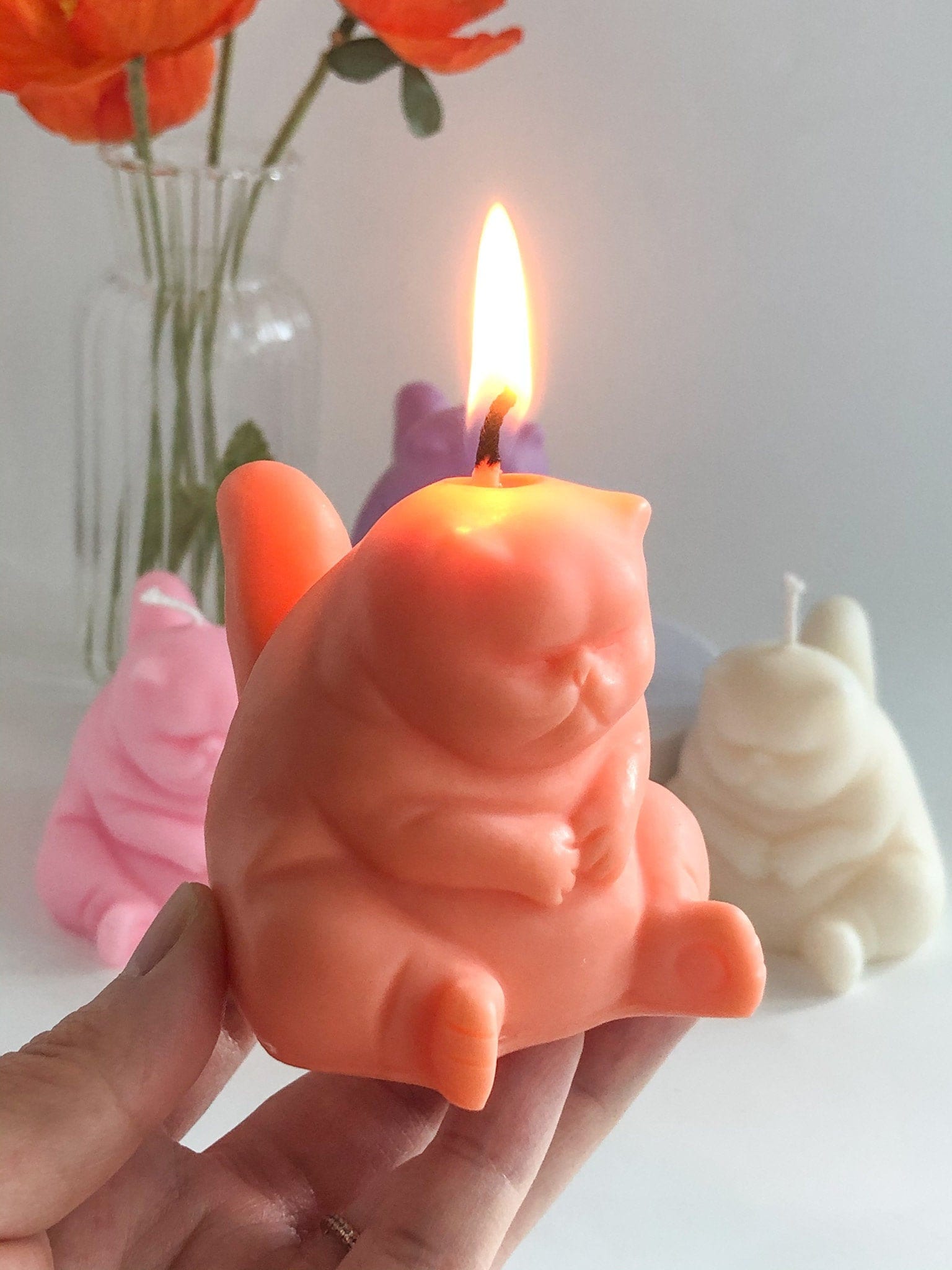 A melting wax candle with a grumpy figure; cartoon style