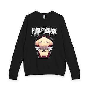 May include: Black crew neck sweatshirt with a graphic of a cartoon dog wearing sunglasses and a coffin. The text "PURINIPURINGO!" is above the graphic in a gothic font. The dog is light brown with a black hat.