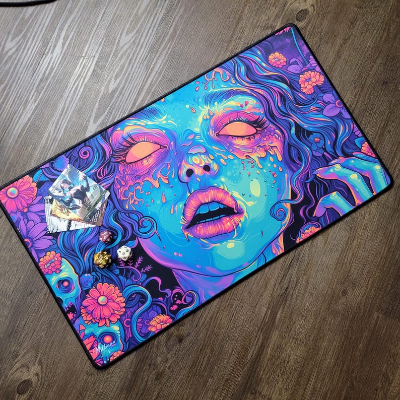 Beautiful zombie MTG playmat perfect for zombie Commander mtg card games. Pushing Up Daisies MTG Zombie Playmat & Gaming Desk mat with stitched edges comes in a large oversized mouse pad too. Perfect for any gamer accessories fitting a horror or psychedelic desk aesthetic. Its also a unique Dia De Los Muertos Playmat for tcg games. This is a black light reactive playmat.