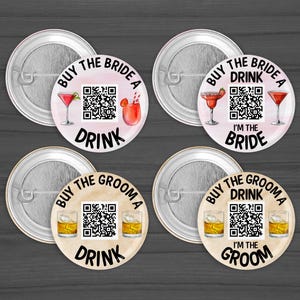 May include: Set of four round pinback buttons. Two buttons say "Buy the Bride a Drink" with cocktail illustrations and QR codes. The other two say "Buy the Groom a Drink" with whiskey illustrations and QR codes. One button says "I'm the Bride" and the other says "I'm the Groom".