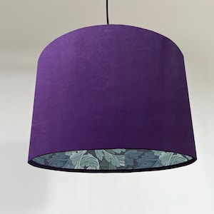 Purple velvet drum lampshade, with William Morris blue leaves paper interior, ceiling light shade