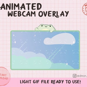 May include: An animated webcam overlay featuring a light green frog peeking over a rectangular frame with a blue sky, white clouds, and sparkling stars. The design includes the text ANIMATED WEBCAM OVERLAY, DMON AT WORK, and LIGHT GIF FILE READY TO USE.
