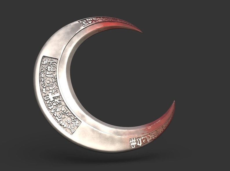 May include: A silver crescent-shaped blade with etched patterns and a reddish hue on the edges. The curved weapon has a sharp point and is likely a decorative or collectible item.