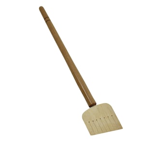 May include: A wooden ice scraper with a long handle. The scraper has a rectangular blade with multiple grooves.