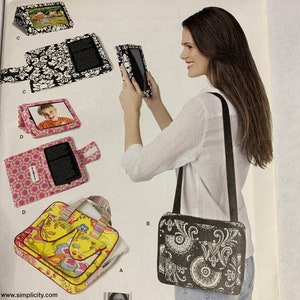 May include: Simplicity pattern 1630 featuring various bag and case designs. Includes a shoulder bag, tablet cases, and a tote bag. The designs showcase floral, paisley, and geometric patterns. The pattern includes the text "U.S. ONE SIZE".