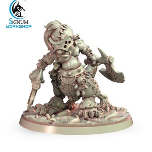 May include: A grey, detailed miniature figurine of a goblin warrior holding a sword and axe. The goblin is wearing a leather skirt and armor, and has a stitched-up face.