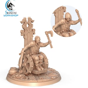 May include: A detailed, tan-colored miniature of a seated warrior figure, wielding an axe and sword. The figure is seated on an ornate throne with wheel-like elements, and a circular base with coins and a pot. A smaller, inset image shows a close-up of the warrior.
