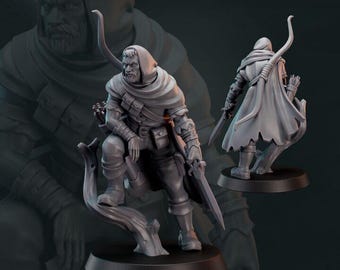 May include: A gray plastic miniature figurine of a hooded figure holding a bow and arrow. The figure is standing on a tree stump base. The figure is wearing a hooded cloak and has a quiver of arrows on their back. The figure is posed in a hunting stance.