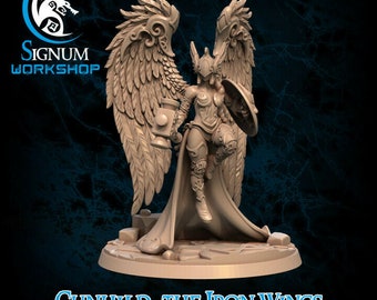 May include: A detailed miniature figurine of a female warrior with large feathered wings, holding a hammer and shield. The figurine is painted in a light brown color and is standing on a circular base. The text "Gunhild, The Iron Wings" is printed below the base.
