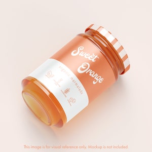 May include: A jar of sweet orange marmalade with a white label and a striped lid. The label reads "Sweet Orange" and "organic marmalade". The jar is filled with a golden-orange preserve.