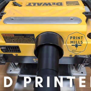 May include: A yellow DeWalt planer with a black 3D printed dust collection adapter attached to the dust port. The adapter is labelled "PRINT MILLS".