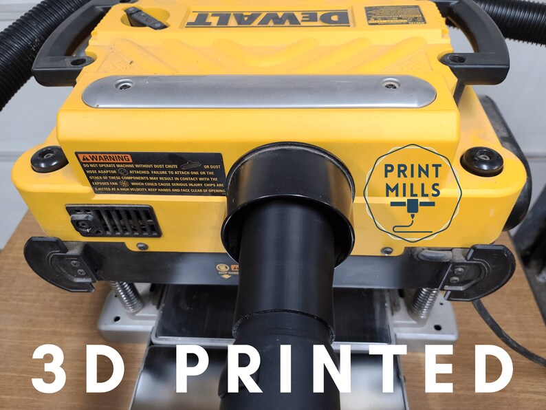 May include: A yellow DeWalt planer with a black 3D printed dust collection adapter attached to the dust port. The adapter is labelled "PRINT MILLS".