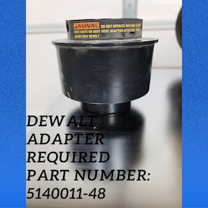 May include: Black plastic dust adapter for a DEWALT power tool. The adapter is required for use with a dust hose. The part number is 5140011-48.