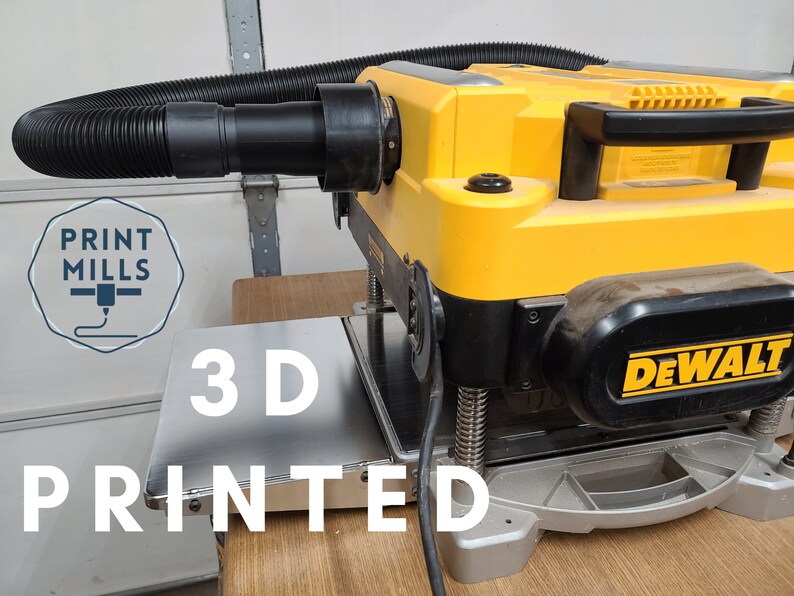May include: A yellow DeWalt planer with a black dust collection hose attached. The planer is sitting on a wooden surface with a 3D printed metal plate in front of it. The text "PRINT MILLS" and "3D PRINTED" are visible in the image.