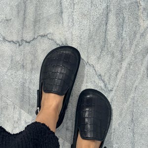 woven leather clogs