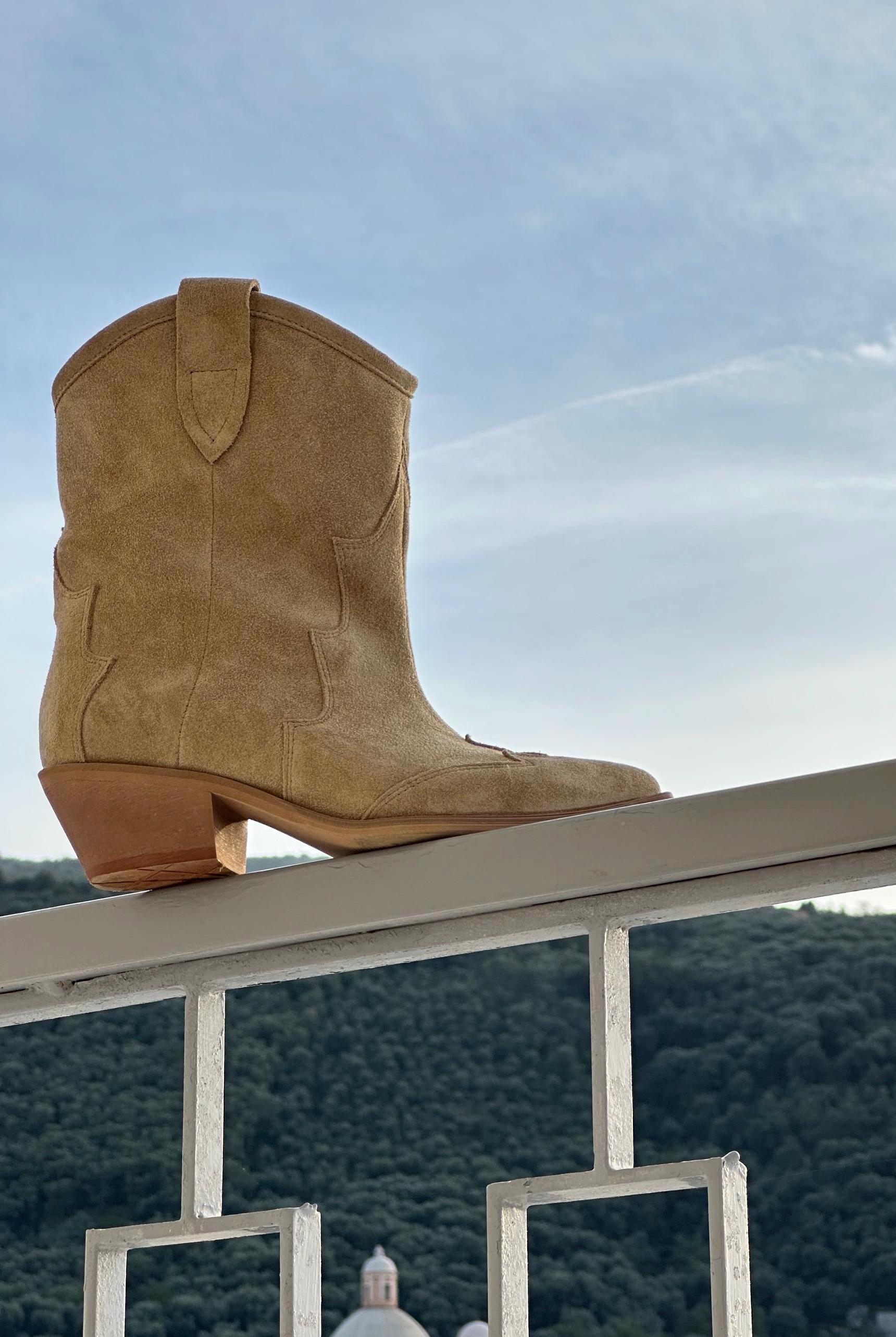 Suede cowboy boots. High boots