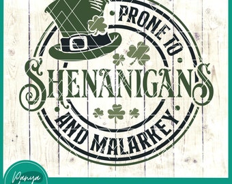 May include: Green and black circular design with a leprechaun hat, shamrocks, and the text "Prone to Shenanigans and Malarkey".