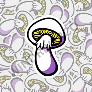 Puede incluir: Una pegatina blanca con un dibujo de una seta con contorno negro. La seta tiene un sombrero blanco, una parte inferior amarilla y un tallo morado. La pegatina está rodeada de otras pegatinas similares.