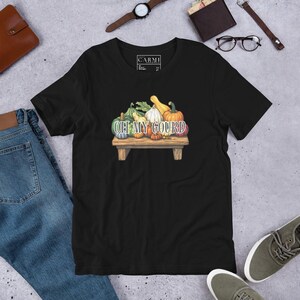 Könnte beinhalten: Schwarzes T-Shirt mit einem Grafikdruck von Kürbissen auf einem Tisch und dem Text "Oh My Gourd".