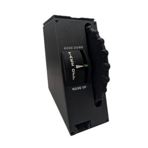 May include: A black flight simulator trim wheel controller featuring a textured vertical adjustment dial. The unit displays white text reading NOSE DOWN, NOSE UP, and TAKE OFF, with a green indicator mark on the central wheel mechanism.