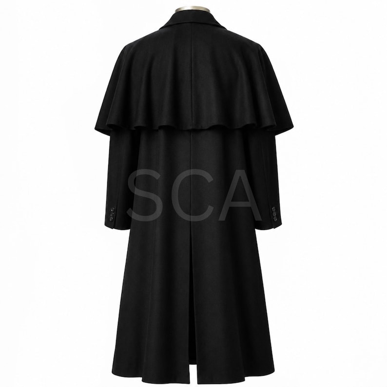 May include: A black long coat featuring a shoulder cape overlay, a structured collar, long sleeves with three buttons at each cuff, and a central back vent. The garment is displayed from the back view, showcasing a smooth, solid black fabric.