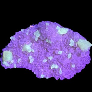 Ultraviolet Fluorescent Calcite Cluster