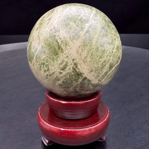 Hand-Carved Vesuvianite Crystal Sphere with Revolving Stand