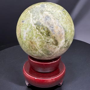 Hand-Carved Vesuvianite Crystal Sphere with Revolving Stand