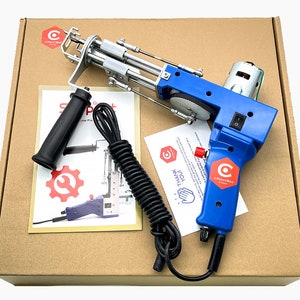 May include: A blue and silver electric heat sealing tool with a black power cord and a black handle. The tool is in a brown cardboard box with a white label that says "C Print Box".