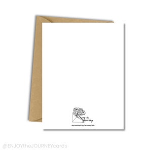 May include: Blank white card with a brown envelope on the left side. The card has a black and white illustration of a floral bouquet in an envelope with the text "Enjoy the Journey" and the website address "etsy.com/shop/EnjoyTheJourneyCards" at the bottom.