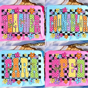 May include: Four colorful t-shirts with the words TEACHER, COUNSELOR, PARA, and SPED. Each shirt has a different background color, with the words in a polka-dot font and flower accents.