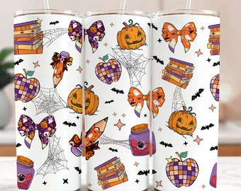 May include: Three white insulated tumblers with a Halloween-themed pattern. The design includes orange jack-o'-lanterns, purple and orange bows, books, apples, pencils, spiderwebs, bats, and stars. Each tumbler has a clear straw.