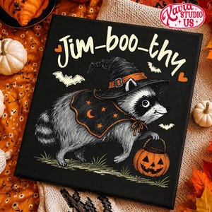 May include: A square black canvas print featuring a gray raccoon wearing a black witch hat and a black cape with orange stars and a crescent moon. The raccoon holds an orange jack-o'-lantern bucket. The text Jim-boo-thy is printed in white.