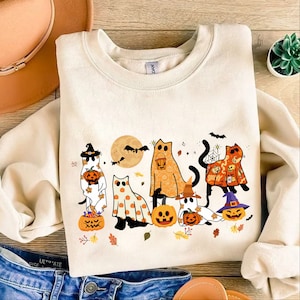黒猫ハロウィンPng、ゴースト猫Png、ハロウィンPng、ハロウィン猫シャツ、秋Png、レトロハロウィンPng、不気味な季節Png、面白いハロウィン