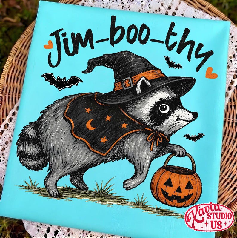 May include: A rectangular canvas print with a bright turquoise background featuring a gray raccoon wearing a black witch hat and cape with orange stars and a crescent moon. The text Jim-boo-thy is printed above, with three black bats and two orange hearts.