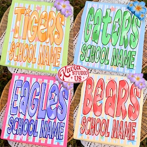 May include: Four colorful school spirit signs with the words "Tigers", "Gators", "Eagles", and "Bears" in large, bubble letters. Each sign has a different color scheme and includes the text "SCHOOL NAME". Decorative flowers adorn the corners.