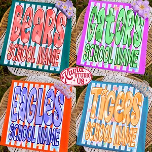 May include: Four colorful school spirit designs with the words "BEARS", "GATORS", "EAGLES", and "TIGERS" in bold, outlined lettering. Each design includes the text "SCHOOL NAME" and star accents. The designs are on a woven background.